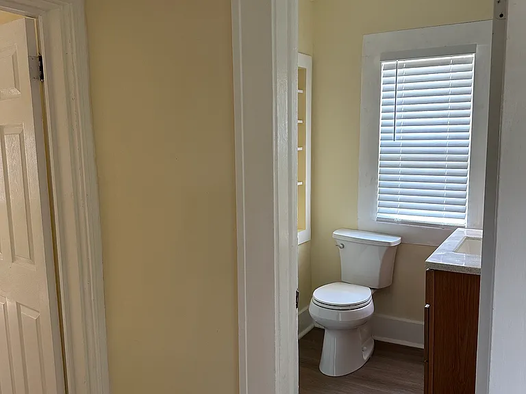Full bath is outside of bedrooms for easy guest use.