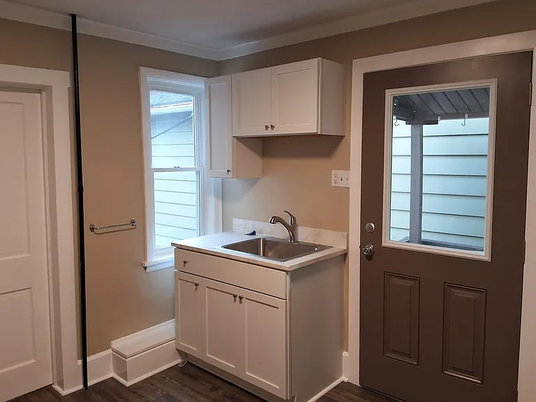 kitchen sink and entry door