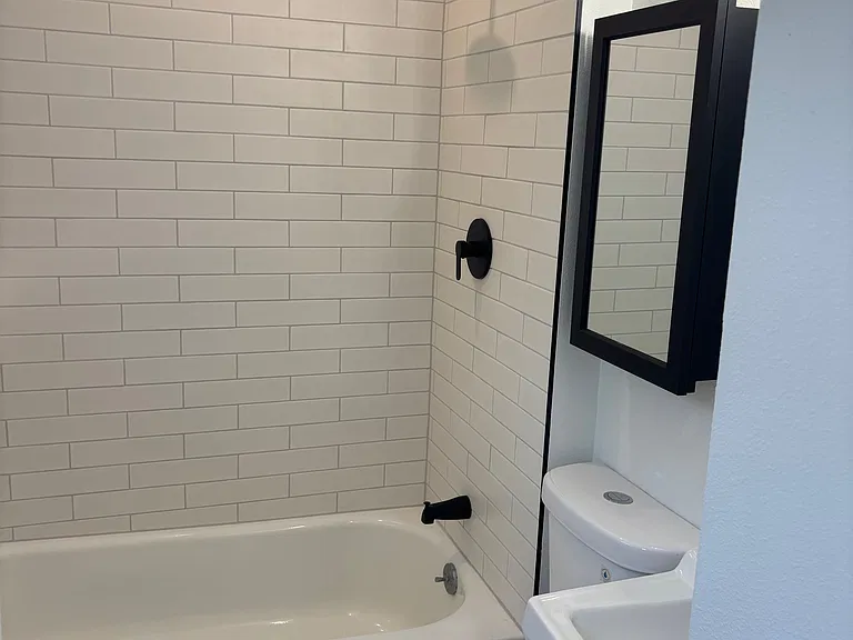 Remodeled bath with new surround