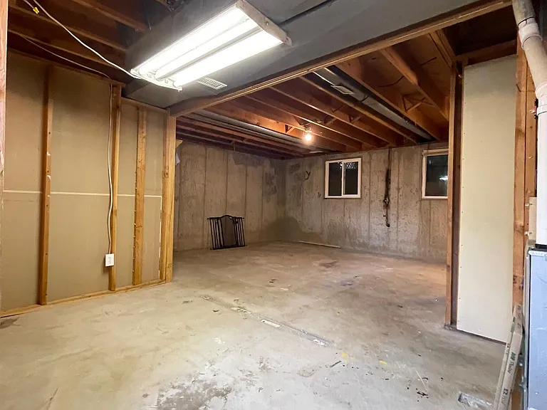 4th level is an unfinished basement with tons of storage. Can also be a great play space for kids.