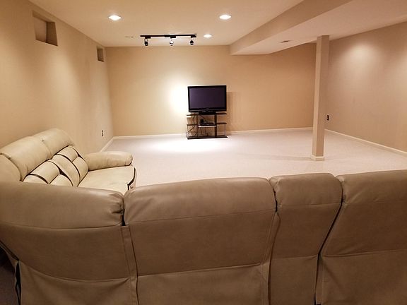 Living area with new recliner leader sofa 2