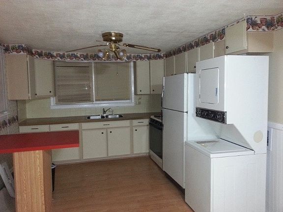 Kitchen with Laundry in unit and room for small table