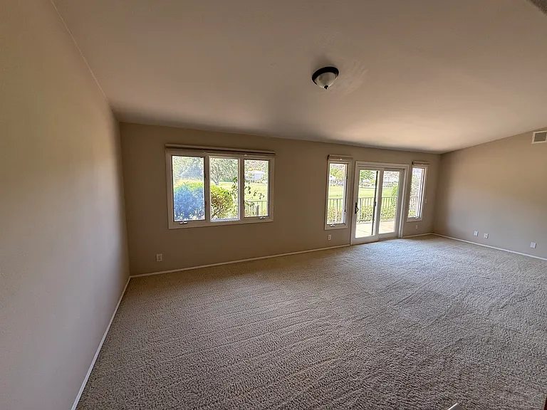 Grand room & Dining room with view of golf course