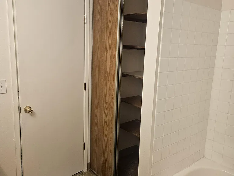 Ample storage in full bathroom