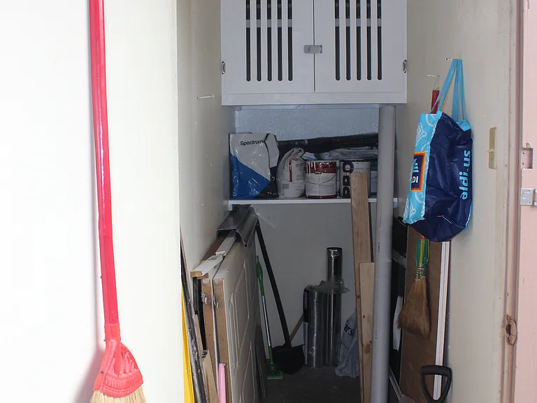 The build-in white closet at the top of the storage room is for Landlord's use.