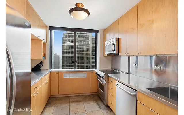 Sold by Douglas Elliman | media 18