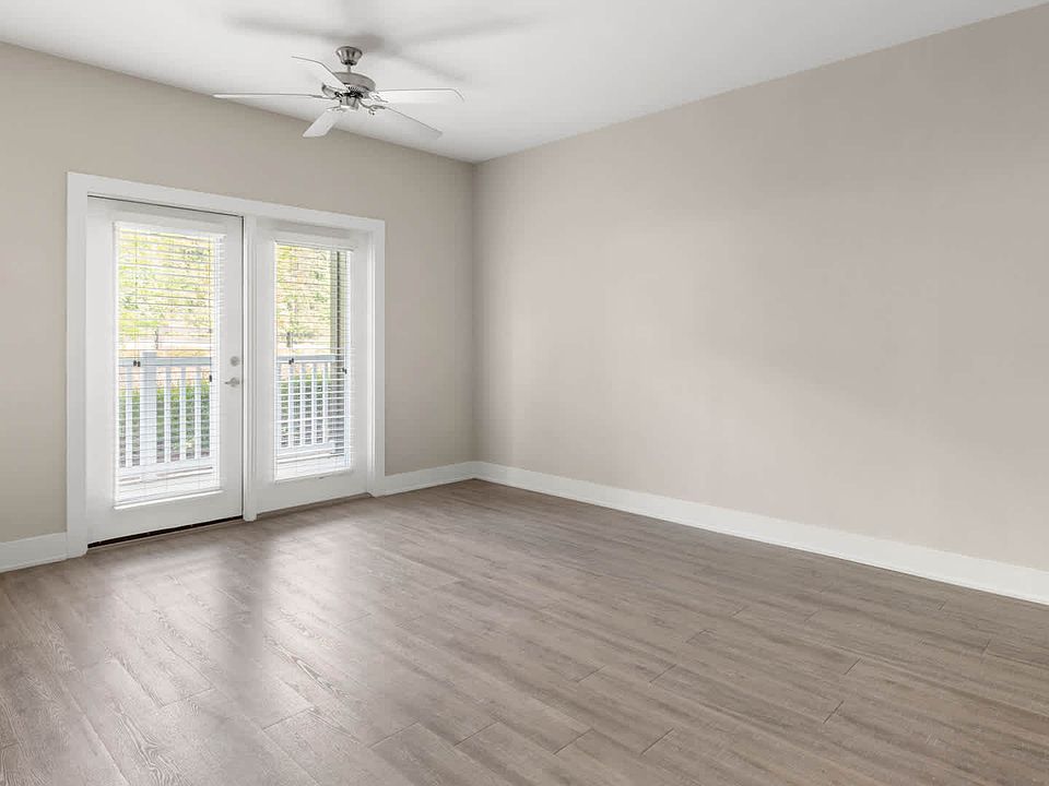 Living Room with Balcony and Hard Surface Flooring