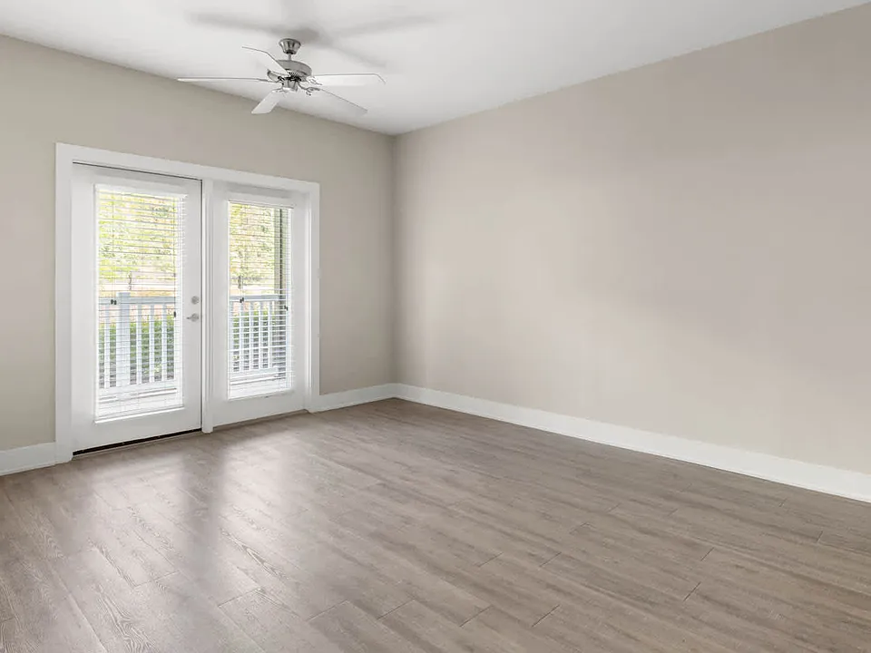 Living Room with Balcony and Hard Surface Flooring