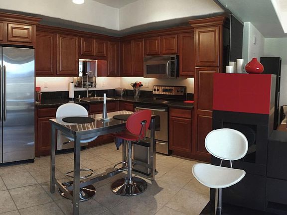 Fully equipped kitchen can be supplied with dishes & cookware for a turn-key rental.