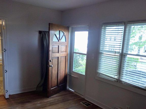 Front door, all windows have blinds and screens.