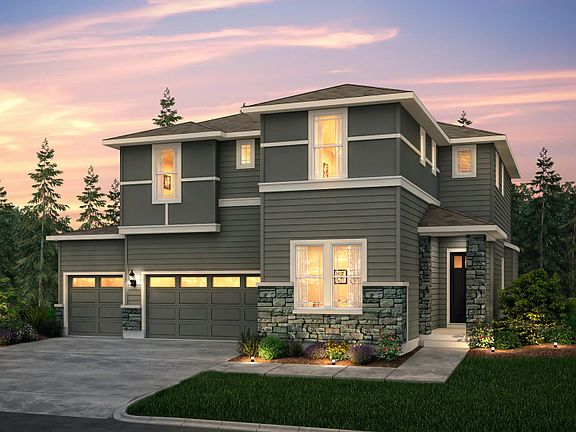 The Lynwood, a single family, two-story home with a three-car garage shown in Exterior Home Design C