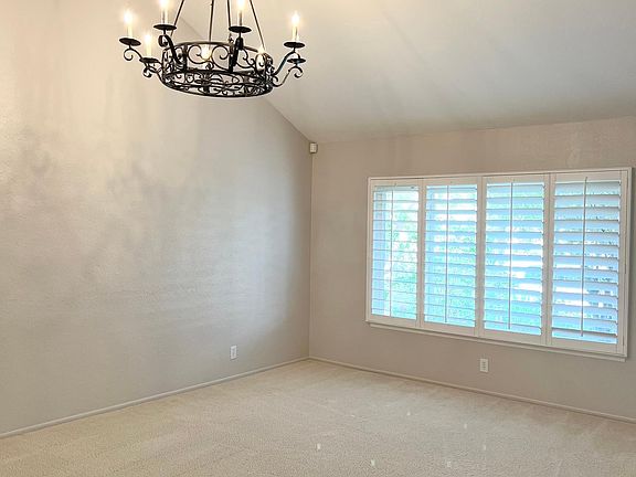 Formal dining room; custom fixtures throughout