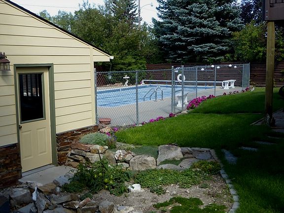 Heated in ground swimming pool maintained by Owner