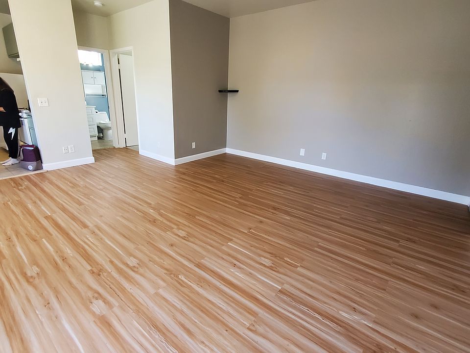 Spacious with laminate floors, and natural light.