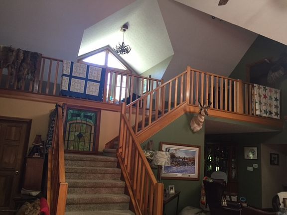 stairs to loft and beds/bath