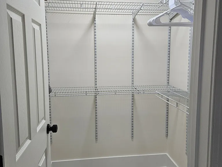Primary Bedroom Waking Closet