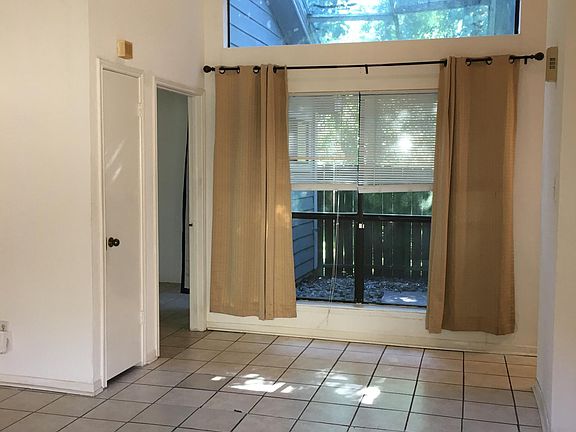 A sunroom facing the front door