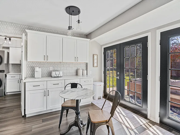 Breakfast Area, Extra Kitchen Storage Cabinets/Buffet Server. French Doors to Fenced Backyard