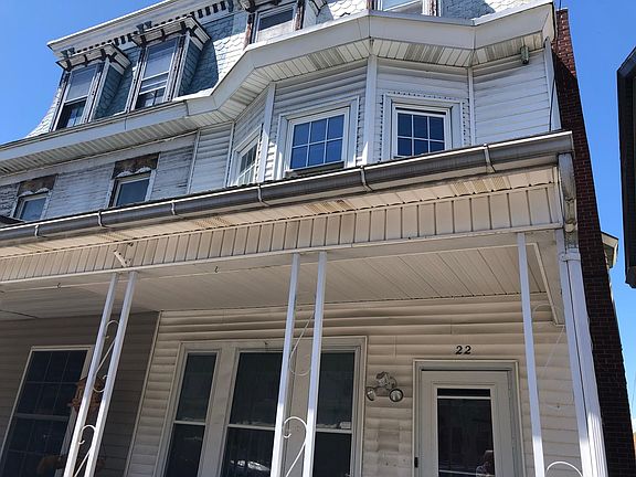 Front of house , new porch roof shingles were installed