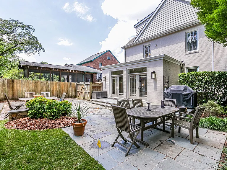 Backyard with stone patio.