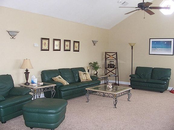 Open floor plan. Most furniture and decorations stay with the house.