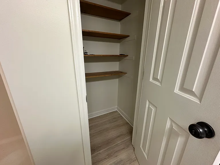 closet/storage space in master bathroom