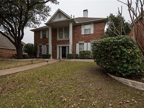 Remodeled master bathroom has seamless glass shower enclosure and beautiful granite tops. Deep tub. Private toilet room with a door.