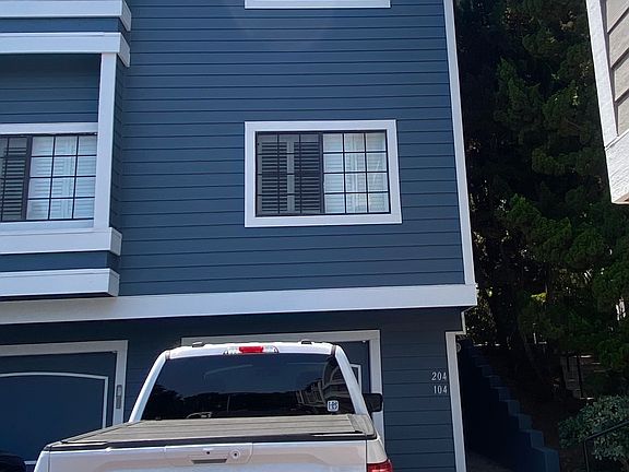 Garage with driveway for two cars!