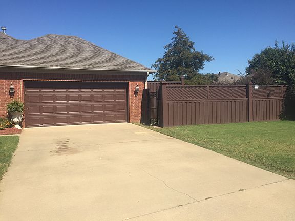 New fence with iron gate