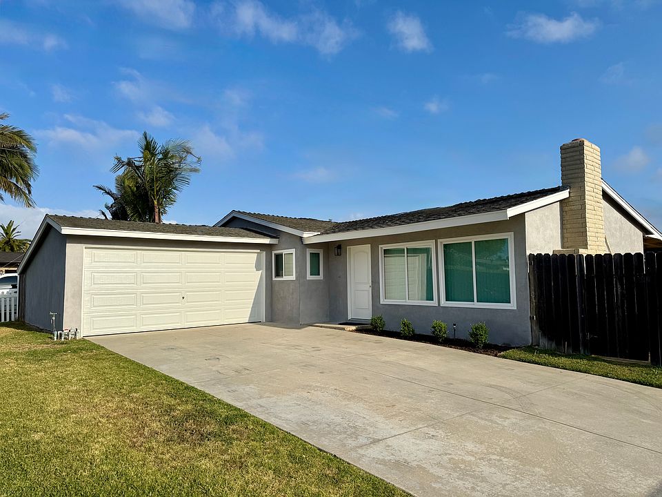 Corner lot with large front yard, long driveway and 2 car garage.