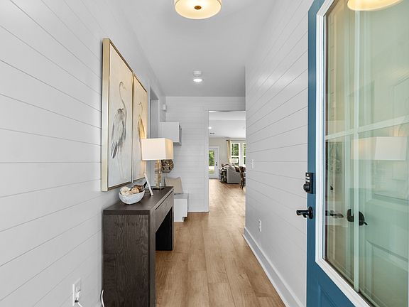 Welcoming entryway in the Summit home plan with stylish finishes and inviting design.