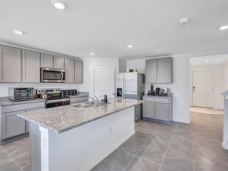 7601 Rosewood Garden Loop — Photo 9