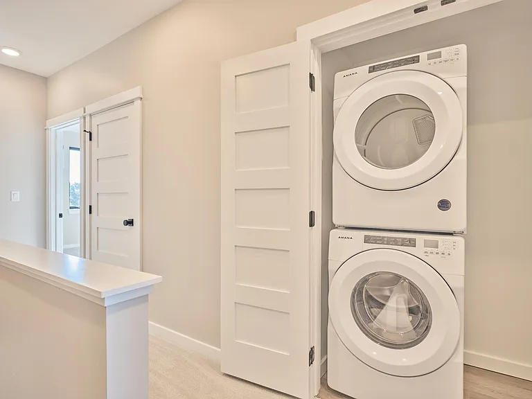 3rd level laundry between two bedroom suites