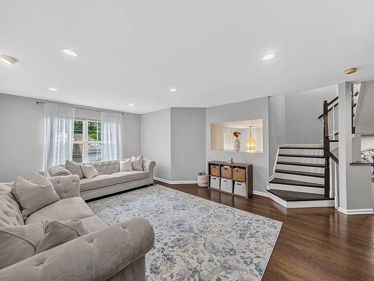 Spacious Formal Living Room with hardwood floors, recessed lighting, and abundant natural light
