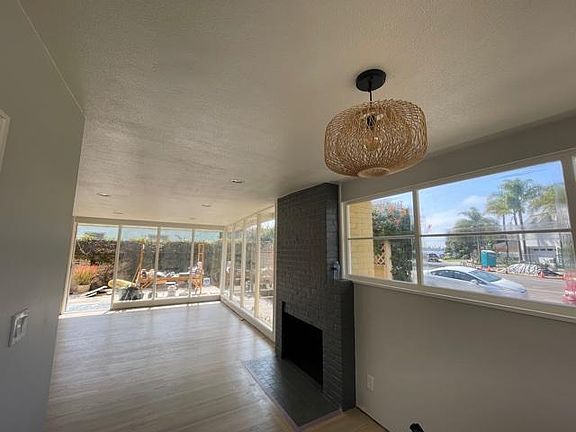 Showcasing Mid-Century Modern Style and Windows in Front Room (again, please excuse the work materials on deck)
