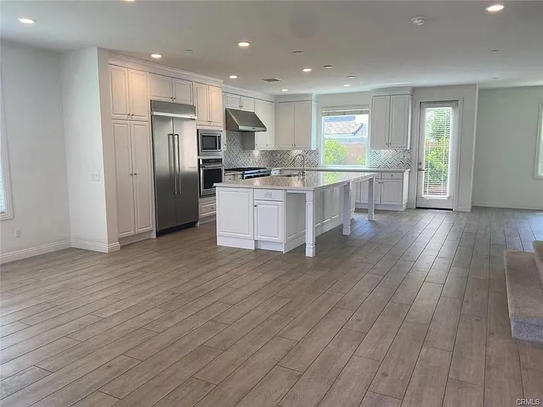 DINNING, KITCHEN AND LIVING ROOM