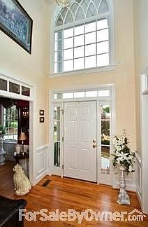 Dramatic Two Story Foyer : Dramatic two story foyer, transom windows, wainscotting, large paladium w