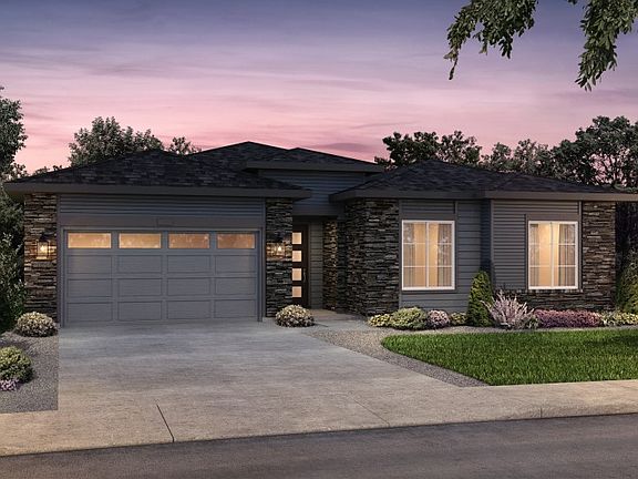 The Prairie elevation boasts a contemporary design with stylish stone accents throughout.