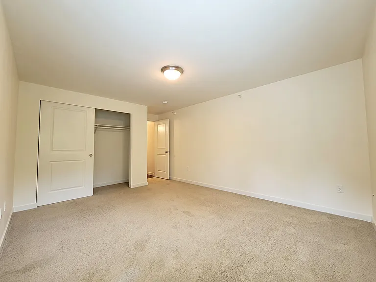 Master bedroom spaciously accomodates king beds and dressers.