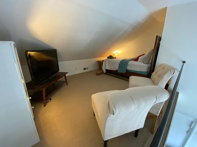 Spacious loft offers bonus space for guests, home office, or tv room