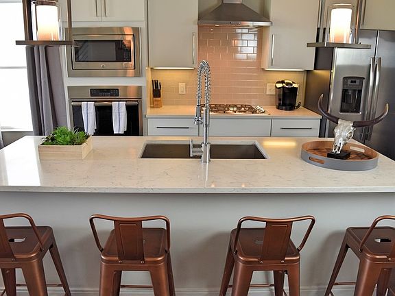 Large island with plenty of seating plus additional dining r