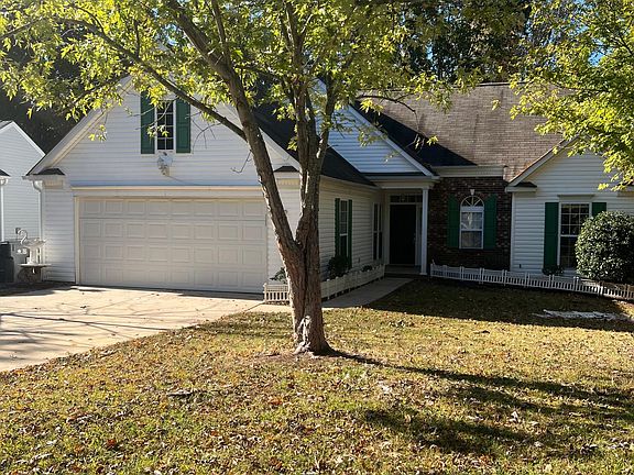 Ranch home in desirable Northwoods with 2 car garage.