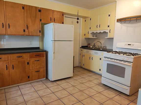 Eat-In Kitchen With Lots Of Light & Ceramic Floor.