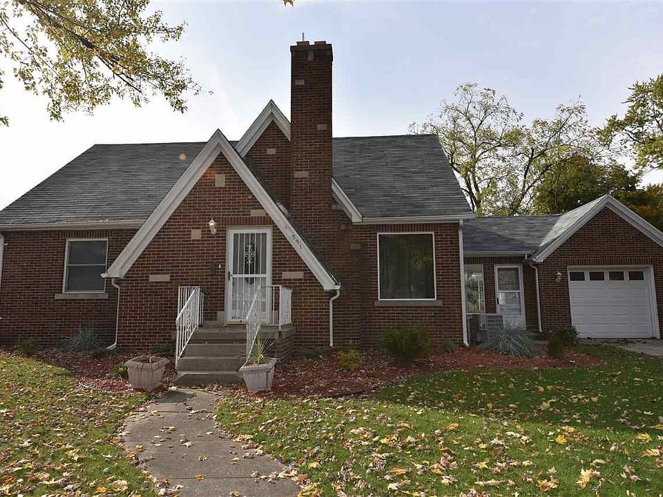 Street view of all brick home
