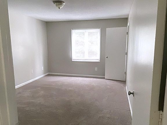 Extra large bedroom with new carpet and freshly painted walls with 2 large closets!