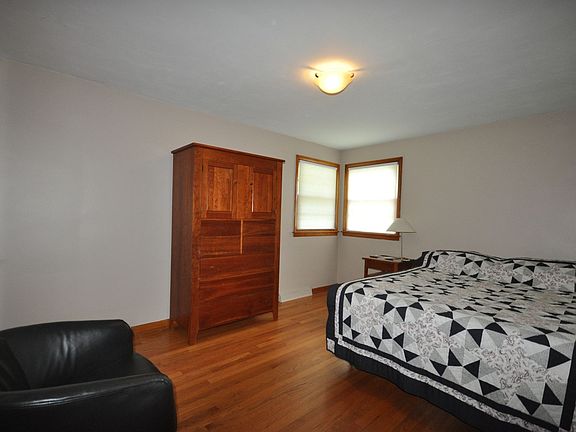 Master bedroom w/ cellular blinds.