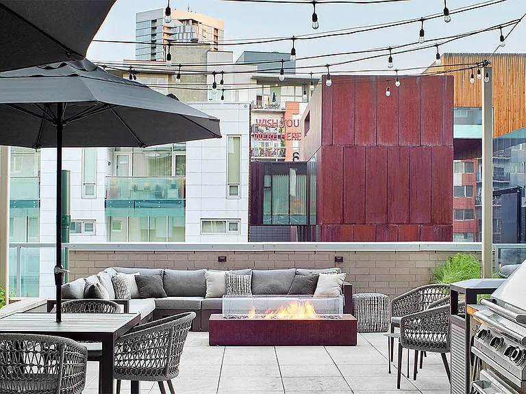 Apartment community outdoor lounge and fire pit at Griffis LoDo in Denver, Colorado.