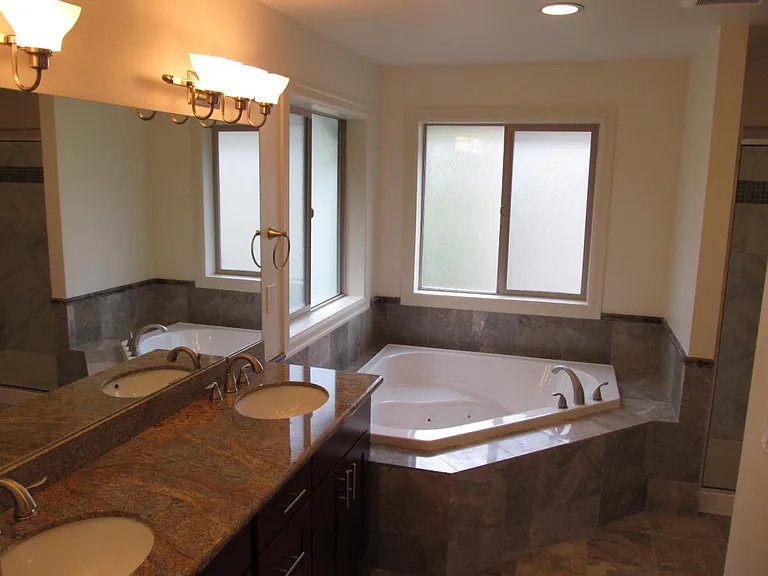 Primary Bathroom with Jacuzzi and Stand-up Shower