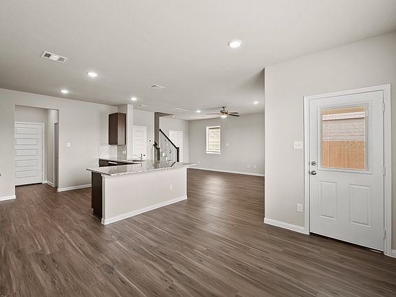 Dining Area to Kitchen and Family Room
