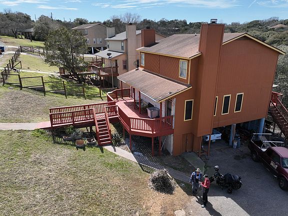 You can see the parking for side A is where the white truck is in this picture. 1-2 cars park under the duplex where the white truck is one in front of the other. Or parking is available in the driveway or in the street and you would enter the front door